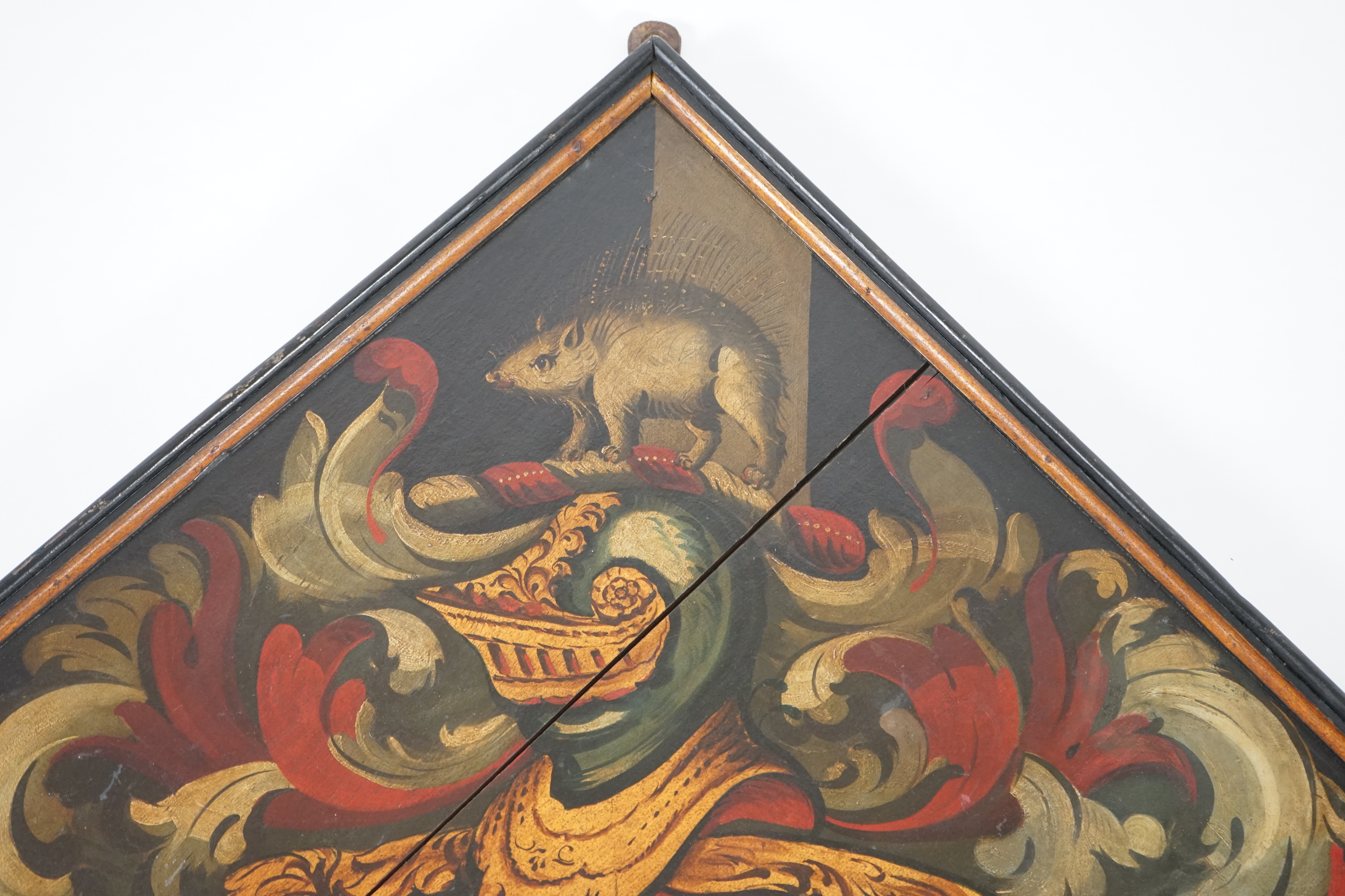 A late 18th / early 19th century oil on wooden panel hatchment